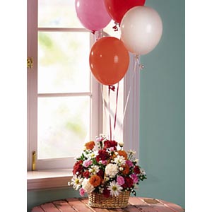 Balloons with assorted flowers in Basket 