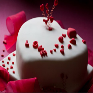(11) 1 pound fondant heart shape vanilla cake