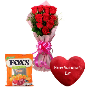 Roses with candy and heart shape pillow