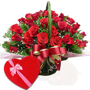 2 dozen red roses in a basket W/ Chocolates