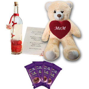 Teddy bear With dairy milk chocolates & bottle message